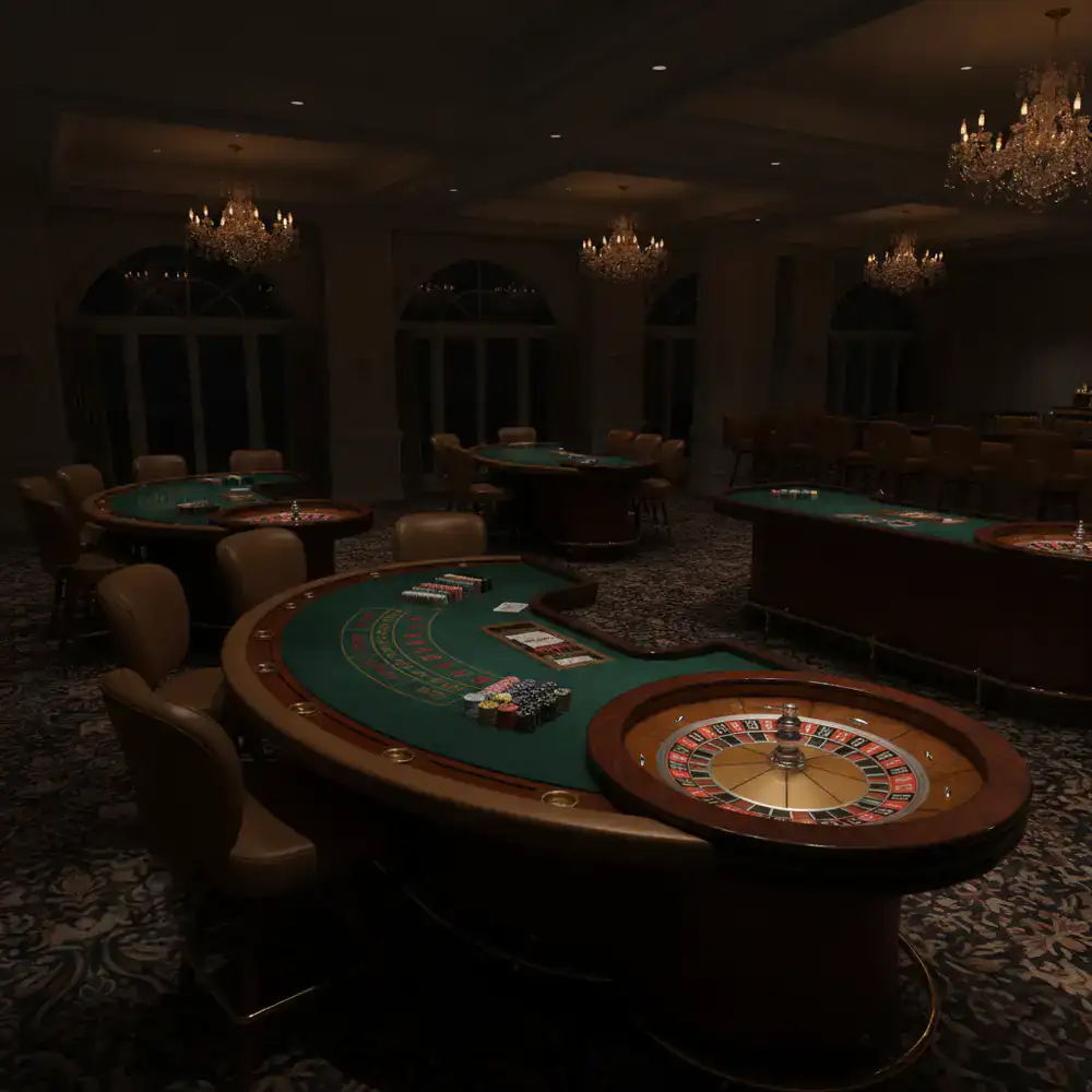 Mesas de blackjack y ruleta preparadas para servicio, sin jugadores
